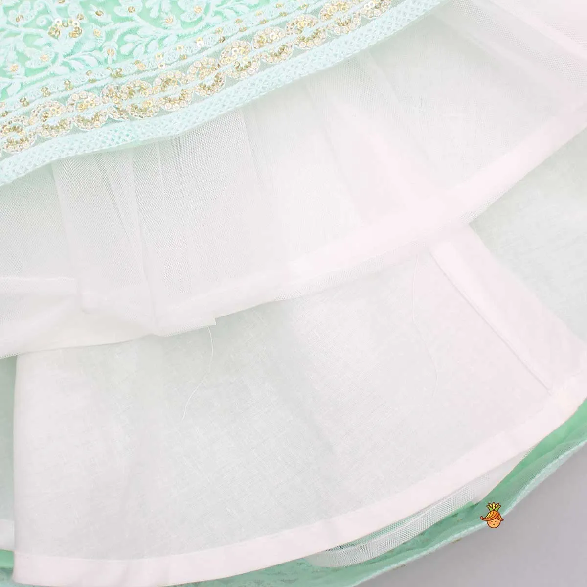 Pre Order: Sequins Thread Embroidered Mint Green Top And Lehenga With Net Dupatta And Potli Bag